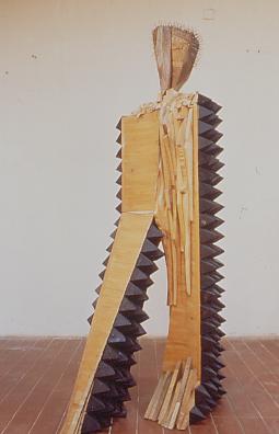 Mario Ceroli, Il Filosofo, 1996, legno, corda e cotto, cm 265x130x70