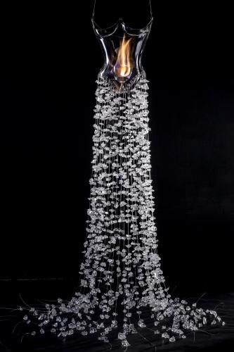 Helen Storey, The Dress of Glass and Flame, 2013, vetro pyrex, bioetanolo, corde in acciaio, cocci di vetro di Murano e cristallo, cm 39x32x21